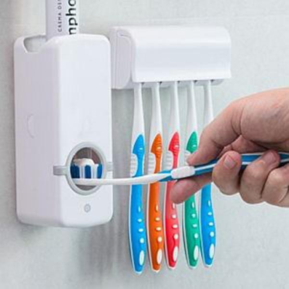 Toothpaste dispenser and brush holder set