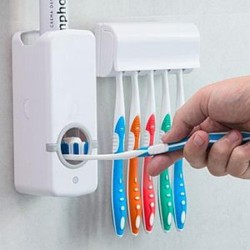 Toothpaste dispenser and brush holder set